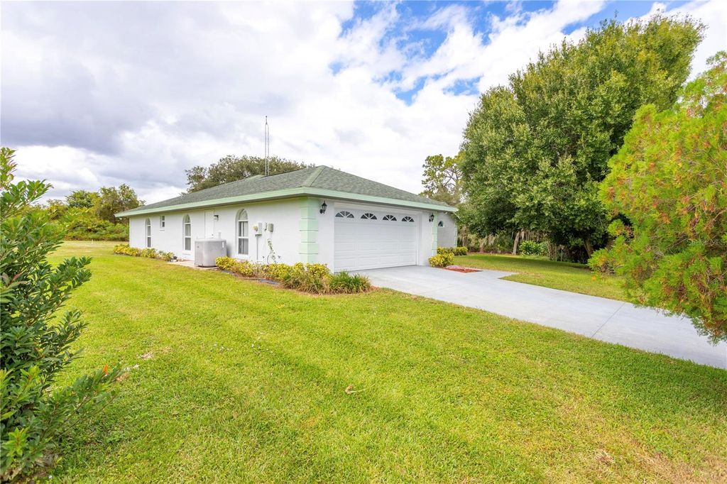 Photo of 306 W Waterway Avenue NW, Lake Placid, FL 33852 (MLS # O6355462)