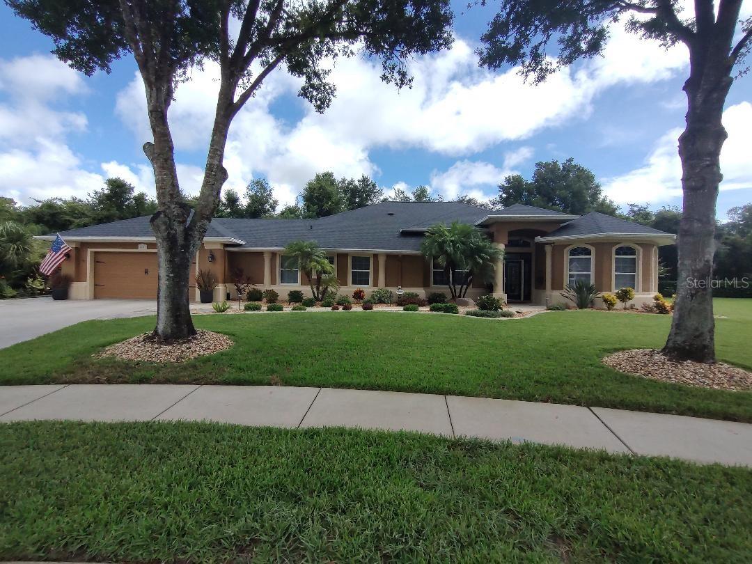 Must see this beautiful and meticulously maintained pool home in Halifax Plantation (Ormond Beach, FL). Contemporary ranch with split floor plan and lots of natural light, large windows, 4 bedrooms, 2 full baths, formal living, dining room and family room open to a spacious kitchen with Counter Bar. Tray ceilings with recessed lighting throughout . New HVAC (2022) new roof (2020) and rebuilt Lanai (2024) Professionally landscaped 2024 with pavers. Master Bedroom and Bath recently updated with new carpet, paint and fixtures. Solar heated pool and hot water tank. Enjoy Country Club living at Halifax Planation and 6 minute beautiful drive to beach. House located on quiet 5 home Cul-De-Sac. Very quiet yet very convenient to shopping, restaurants, hospital and airport.