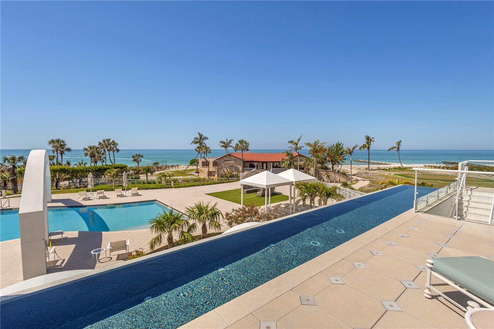 Step into unparalleled elegance with this stunning 4-bedroom, 4.5-bathroom beachfront condo, where modern sophistication meets coastal serenity. This exclusive residence boasts floor-to-ceiling windows that fill the space with natural light and showcase breathtaking panoramic Gulf views from every angle. Designed for ultimate privacy and comfort, the unit features direct elevator access, a private 3-car garage, and a private pool for a truly elevated lifestyle. Entertain effortlessly in the state-of-the-art movie theater room or relax in your expansive living area surrounded by stylish, high-end finishes. The gourmet kitchen flows seamlessly into spacious open plan living and dining areas, while each bedroom offers en-suite bathrooms and custom detailing. The lavish primary suite includes huge his and hers walk-in closets and a spa-like bath retreat. With this rental, you will enjoy EXCLUSIVE MEMBERSHIP AT THE ST REGIS LONGBOAT KEY, granting you access to world-class amenities and five-star service. This is more than a home—it’s a statement of luxury.
