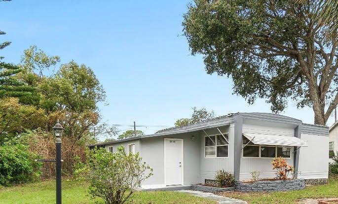 INVESTOR ALERT, HIGH ROI!!! NO HOA!!! NO LOT RENT!!! NO AGE RESTRICTIONS! FINANCING OPPORTUNITY AVAILABLE! This 2+ office, or 3 bedroom 2 bath Mobile home with Central Heat and Air, Open living room / kitchen area carpet to tile and vinyl flooring throughout remainder of home. 2nd entry with private bedroom and bath, insulated, and Central Air Conditioning AND STILL A SCREENED IN BACK PORCH AREA!! Long driveway can accommodate up to 3 cars as well as 2 outside storage areas one with hook ups for Washer and Dryer. Close to shopping, A rated schools, the beach, walking distance to food and entertainment. Opportunity for a package deal with up to 4 mobile home units and 1 single family home available, information upon request. All information is deemed reliable however not guaranteed.
