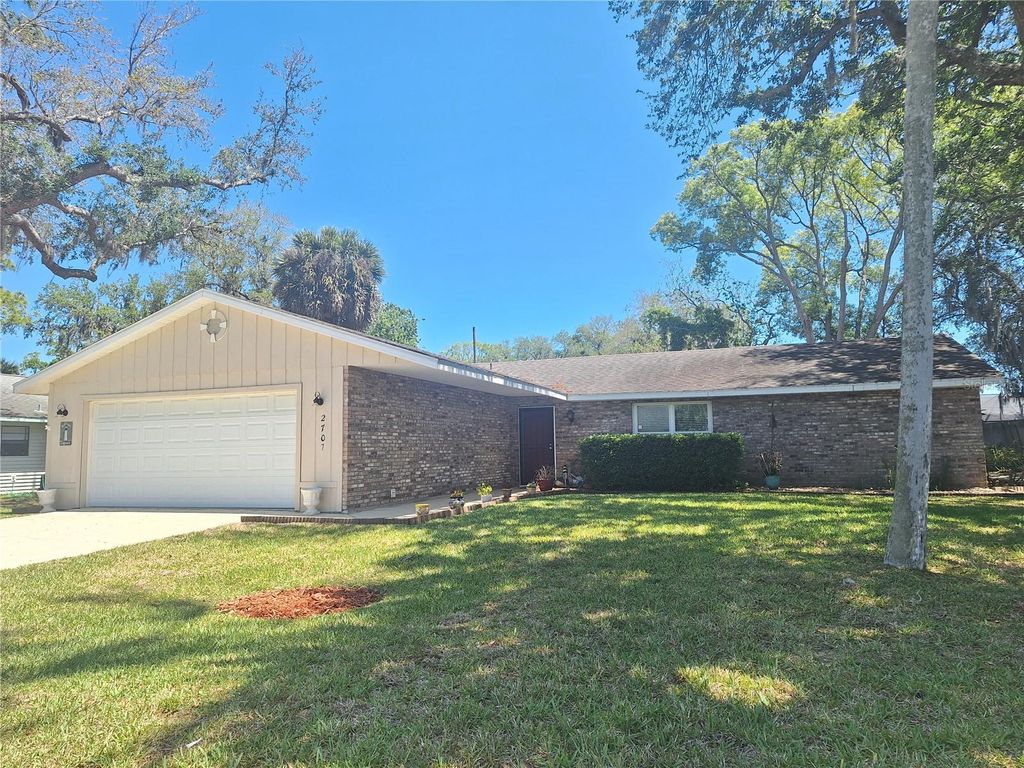 Photo of 2707 Pine Tree Drive, Edgewater, FL 32141 (MLS # NS1087891)