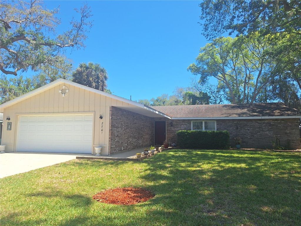 Photo of 2707 Pine Tree Drive, Edgewater, FL 32141 (MLS # NS1087891)
