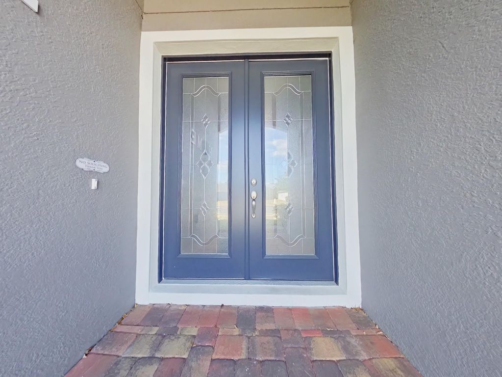 Photo of 703 Calabria Way, Howey In The Hills, FL 34737 (MLS # G5109294)