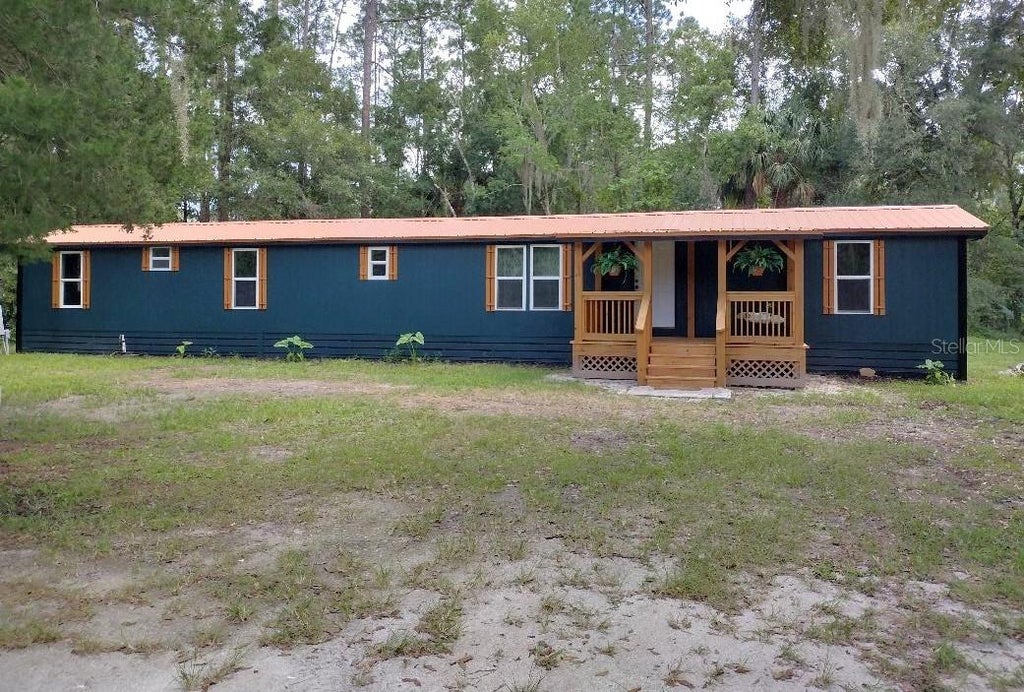 Photo of 4055 Mahogany Boulevard, Bunnell, FL 32110 (MLS # FC321561)