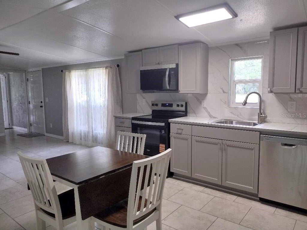 Photo of 4055 Mahogany Boulevard, Bunnell, FL 32110 (MLS # FC321561)