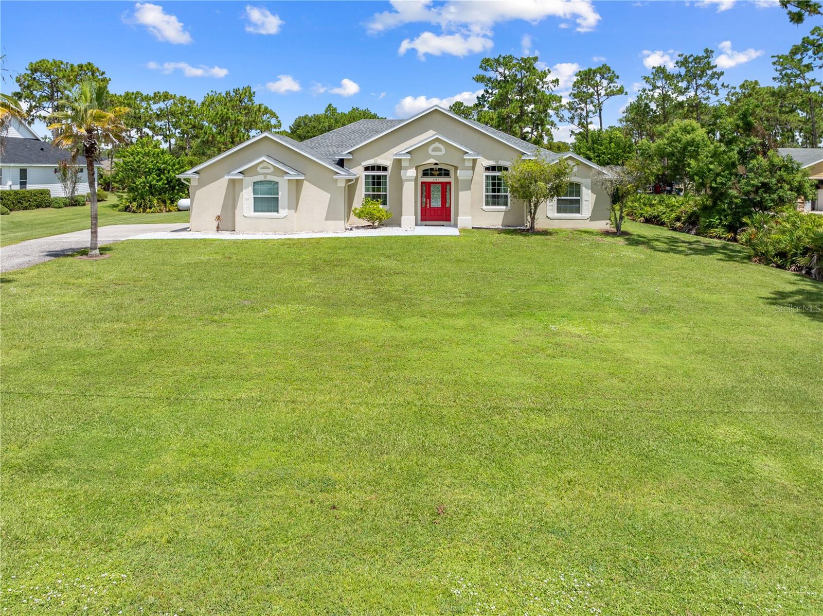 Welcome to Bay Lake Ranch, a close-knit community known for its larger parcels, annual events, and welcoming atmosphere—including the beloved Halloween hayride! This 4-bedroom, 3-bath home sits on a spacious 1-acre lot and offers 2,084 square feet of well-designed living space. Enjoy year-round outdoor living with a screened-in pool, carport, two-car garage, and a 30x30 detached workshop featuring two roll-up doors—ideal for storage, hobbies, or home-based projects. A Generac whole-house generator provides added security and peace of mind. Conveniently located near Orlando’s top attractions and within easy reach of Florida’s beautiful beaches, this home blends rural comfort with unbeatable convenience in one of the area's most welcoming neighborhoods.
