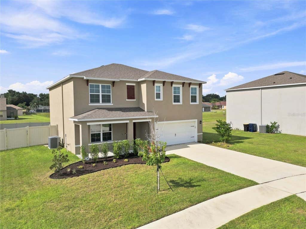 Photo of 787 Auburn Grove Ct, Auburndale, FL 33823 (MLS # L4964468)