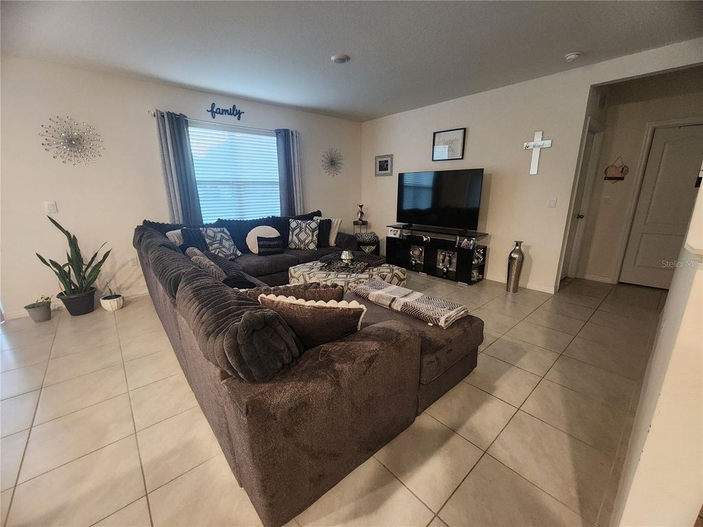 Photo of 1075 Griffon Avenue, Lake Alfred, FL 33850 (MLS # TB8473829)