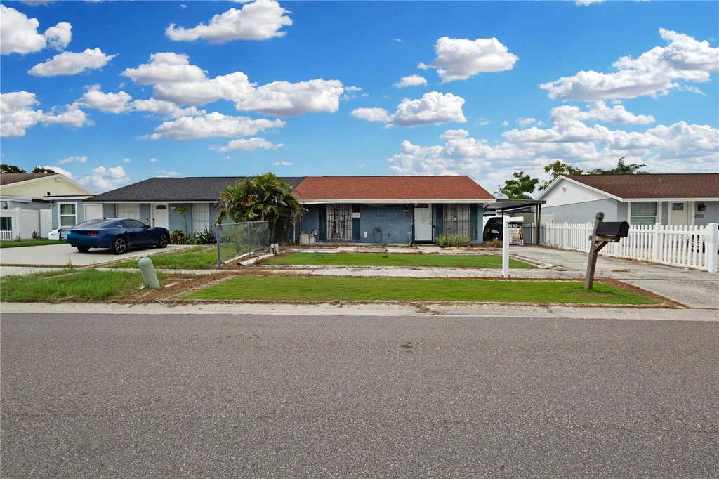 Photo of 8584 Briar Grove Circle, Tampa, FL 33615 (MLS # TB8535993)