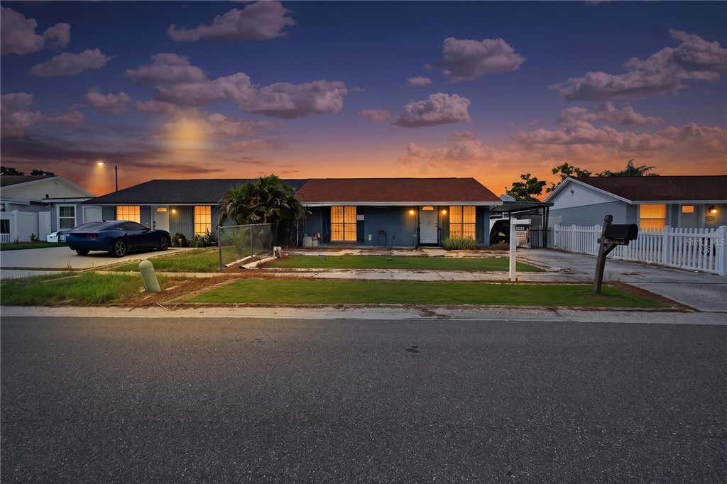 Photo of 8584 Briar Grove Circle, Tampa, FL 33615 (MLS # TB8535993)