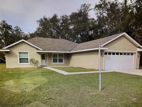 Photo of 252 Locust Pass Drive, Ocala, FL 34472 (MLS # OM714640)