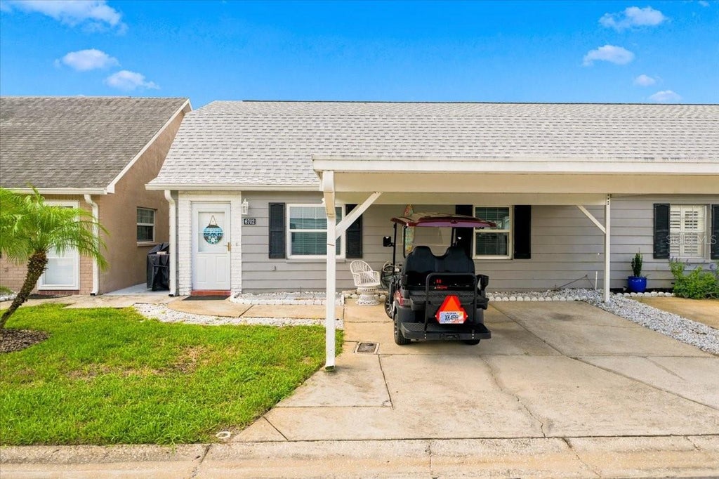 Photo of 6702 Dartmoor Lane #7A, New Port Richey, FL 34653 (MLS # W7889157)