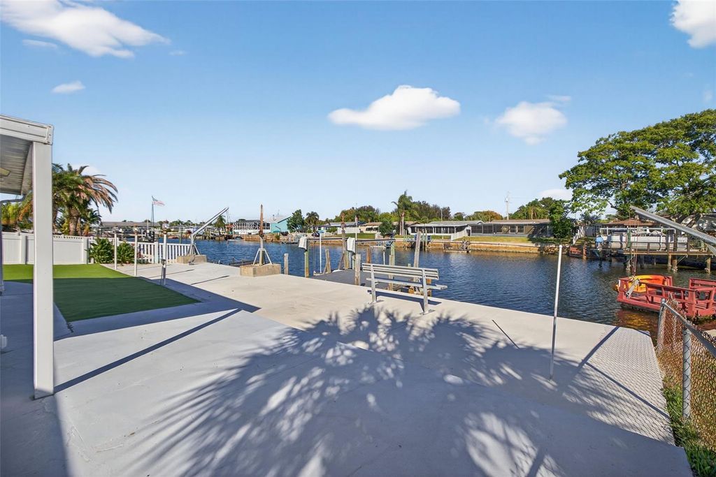 Photo of 12734 2nd Isle, Hudson, FL 34667 (MLS # TB8464746)