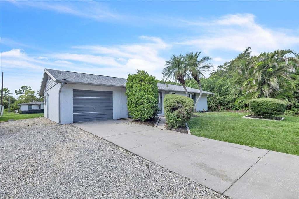 Photo of 23213 Olean Boulevard, Port Charlotte, FL 33980 (MLS # C7528984)