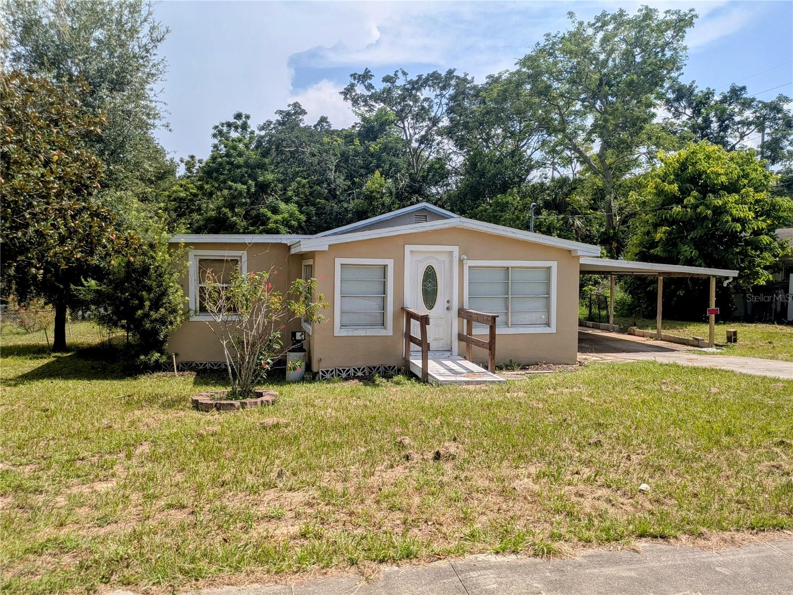 Check out this blank slate in CLERMONT'S GOLF CART DISTRICT, on a double lot, with a large private back yard! The roof, AC, and water heater have all been replaced in the past 5 years! This property is perfect for a first time home buyer and should qualify for FHA and VA financing! The property is not only in Clermont's golf cart district, but Clermont also allows for short term rentals, making this an ideal opportunity for both buy and hold investors as well as flippers!