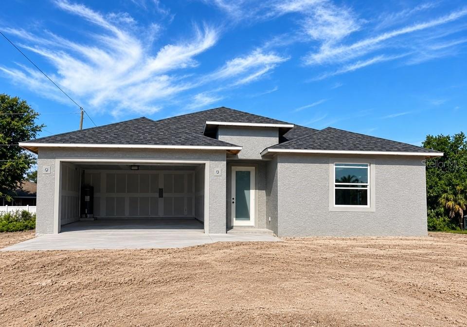 Photo of 6076 Coliseum Boulevard, Port Charlotte, FL 33981 (MLS # D6148724)