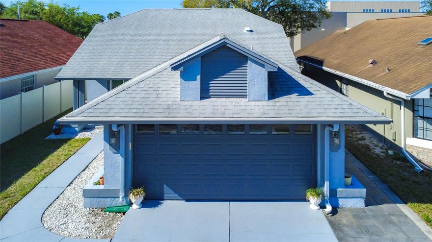 Welcome home to this meticulously maintained 2-bedroom, 2-bath beauty nestled in the Suncrest community of Orlando! From the moment you arrive, the charming covered front porch sets the tone for what's inside. Step through the door and enjoy a bright, open-concept living and dining room combo with high ceilings and oversized sliding glass doors that flow seamlessly to a screened lanai — perfect for relaxing Florida evenings. The updated eat-in kitchen is both functional and stylish. The entire home has been lovingly cared for and pride of ownership shows in every corner. Move-in ready and loaded with quality upgrades throughout, this home is one you don't want to miss. Conveniently located minutes from University Blvd, top-rated schools, shopping, and dining. Come see it for yourself!