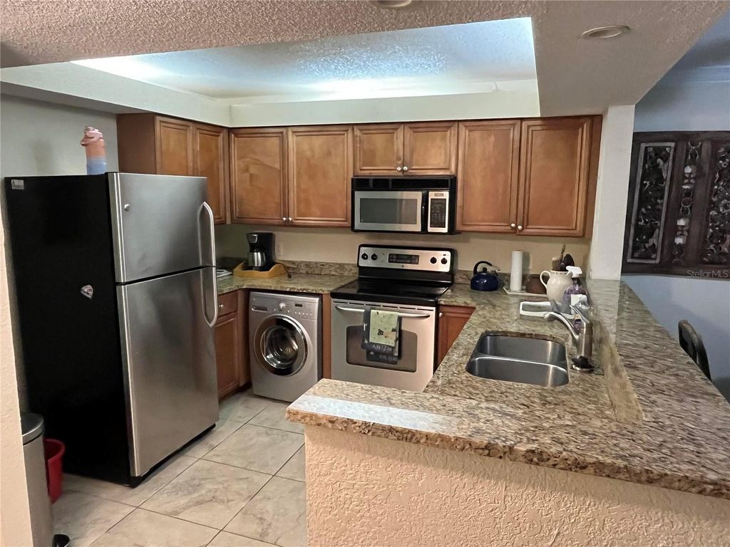 Photo of 2740 Coconut Bay Ln #317, Sarasota, FL 34237 (MLS # A4689184)