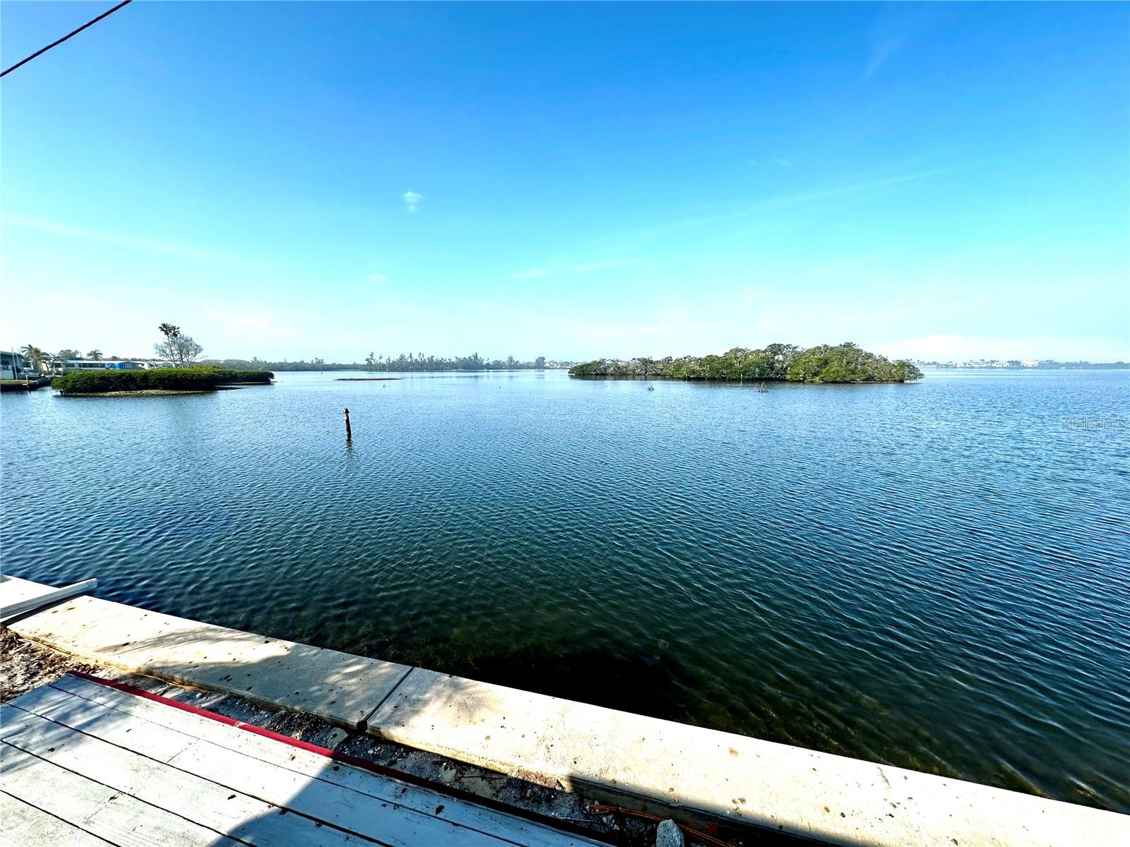 WATERFRONT LOT/SHARE AVAILABLE FOR SALE. Located in TROPIC ISLES, A 55+ RESIDENT OWNED WATERFRONT community. This property offers a unique opportunity to install a new manufactured home. The unit on site sustained significant flood and wind damages from recent hurricanes and will require demolition. SELLING LOT/SHARE ONLY. SHARE INCLUDES A BOAT DOCK LOCATED ACROSS THE STREET FROM THE PROPERTY. **Seller will be paying for demolition charges**