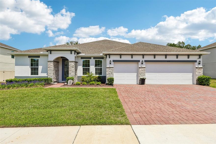Welcome to a home that truly checks every box – and then goes a step further! BUILT IN 2024 and thoughtfully UPGRADED THROUGHOUT (over 90k in upgrades!), this MOVE-IN READY 4-bedroom +office, 3-full bath home in the desirable Mount Dora community of Bargrove Estates offers the feel of brand-new construction without the wait. Positioned on an oversized .35 ACRE LOT, fully fenced with no immediate rear neighbors, this property delivers both space and privacy. You will appreciate recent enhancements that include: sealed front and rear pavers (including the front stonework), exterior Govee lighting, and a backyard transformation into a true entertainer’s paradise – complete with a HOT TUB, FIRE PIT, and dedicated LOUNGE AREA designed for relaxing or hosting year-round. Not to be outdone, the interior delivers a bright, flowing layout anchored by a CHEF’S GOURMET KITCHEN that truly serves as the heart of the home. A massive QUARTZ ISLAND with bar seating sits beneath designer PENDANT LIGHTING, while STAINLESS STEEL APPLIANCES – including a GAS RANGE – pair perfectly with the stylish herringbone tile backsplash. A walk-in pantry adds to the functionality, and the kitchen seamlessly connects to the dining area and spacious family room. Oversized sliding glass doors extend the living space outdoors to the COVERED & EXTENDED LANAI, creating effortless INDOOR/OUTDOOR LIVING. This single-story floor plan features spacious bedrooms, upgraded bathrooms, a dedicated office/flex space, and a versatile formal/bonus room. The SPLIT BEDROOM layout provides ideal separation, with your PRIMARY SUITE tucked into its own private wing – offering a generous bedroom, beautifully finished en-suite bath with a dual sink vanity, soaking tub, and separate shower, plus an expansive WALK-IN CLOSET. Secondary bedrooms and bonus living spaces are located on the opposite side of the home, along with two additional full baths – including one at the back with direct access to the lanai. Additional highlights include LUXURY VINYL PLANK FLOORING throughout the main living areas, a 3-CAR GARAGE with epoxy flooring and abundant storage, a whole-home WATER SOFTENER/FILTRATION SYSTEM, tankless water heater, and an EV CHARGER already in place. Residents will love the open green space of the community park and the welcoming neighborhood feel – all with a low HOA. Conveniently located with easy access to US-441, the 429, and Lake Apopka, you are just minutes from shopping, dining, and outdoor recreation. Spend weekends exploring historic downtown Mount Dora, head north toward The Villages, or enjoy quick access south to Central Florida’s world-famous attractions. A quiet, tranquil setting with everyday convenience – this is the one you have been waiting for. Bargrove Estates welcomes you HOME - call today to schedule your tour!