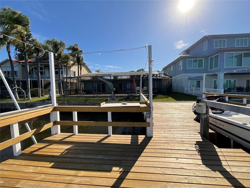 Photo of 300 Driftwood Drive W, Palm Harbor, FL 34683 (MLS # TB8500861)