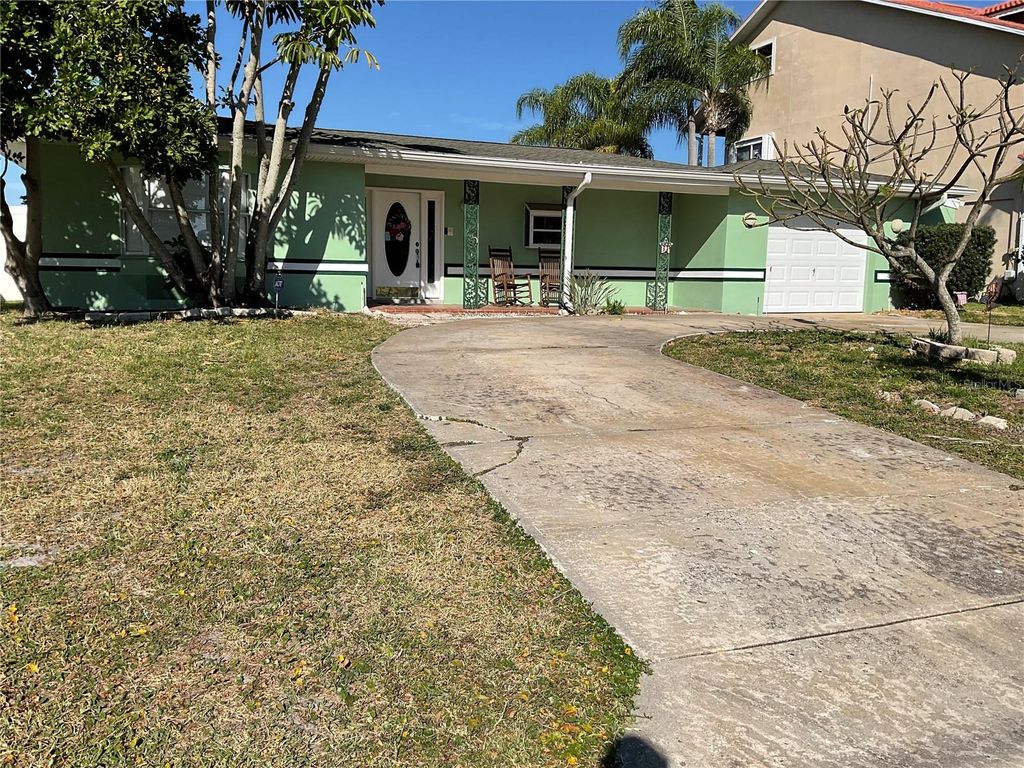 Photo of 300 Driftwood Drive W, Palm Harbor, FL 34683 (MLS # TB8500861)