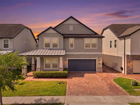 Photo of 1369 Bristol Oaks Way, Orlando, FL 32825 (MLS # O6410590)