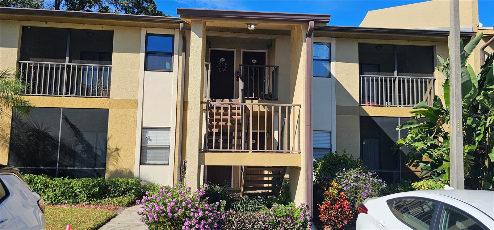 Short Sale. Welcome to THE GATED, WATERFRONT community of Bella Vista situated on the beautiful LAKE SEMINOLE! NO FLOOD REQUIRED!!! (2023) ROOF, (2022) HVAC, (2024) INTERIOR PAINT, (2023) VINYL WATERPROOF FLOORING! The community features two pools, one being a (salt water heated) pool, hot tub, fitness center, canoes & kayak storage, walking trails, private dock for fishing and a barbecue area. Lots of amenities for family and entertaining friends! This spacious 2 bed, 2 bath property is located on the first floor. As you step inside, you’re invited to an open living space with ample natural light, creating a warm and welcoming atmosphere throughout. The well-appointed kitchen features bar seating, wood cabinetry, granite countertops, large tile floors, and a separate breakfast nook/office space. The master suite is complete with a generous walk-in closet and a private ensuite bathroom with an enclosed glass shower. The additional bedroom offers versatility for guests, family members, or home office space. Step outside to your private patio, where you can enjoy morning coffee or evening cocktails while enjoying the serene surroundings. Conveniently located near shopping, dining, entertainment, exploring our beautiful beaches, close proximity to major highways and transportation options and everything the Tampa Bay area has to offer. Whether you're seeking a primary residence or an investment opportunity, this home presents an unparalleled lifestyle of comfort and convenience. Don't miss your chance to make this your own – schedule a showing today!