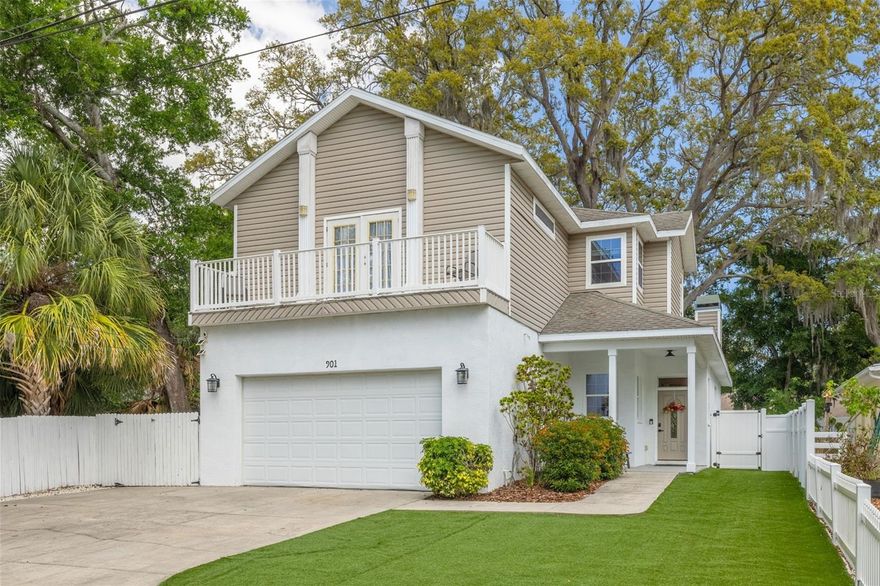 Welcome to this 4-bedroom, 3-full bath Hidden Gem, offering the perfect blend of space, comfort, and style. Walking into large great room encompassed with high ceilings leading you to the eating area and the secluded kitchen. Room off garage offers an office or a dining area. There is a small bedroom downstairs and next to it is a nice shower. Walking upstairs you will be greeted by 2 bedrooms and bath. Down the hall is an oversized master bedroom with balcony with a secondary closet in master bathroom which offers a spa-inspired soaking tub designed for relaxation and a shower and double sinks. Step outside onto the balcony to and enjoy the greenery and Sisler field.— Most of all you will enjoy the amazing backyard with deck with plenty of room for outdoor dining and entertaining. Unbelievable oak trees adds magnificence to this yard.  An ideal home for a growing family that is close to schools. Bike to sparkling Sunset Beach, Fred Howard Park Beach. A short drive to the entertainment, boating, culture, restaurants, and boutiques of vibrant downtown Tarpon Springs and the Historic Sponge Docks!