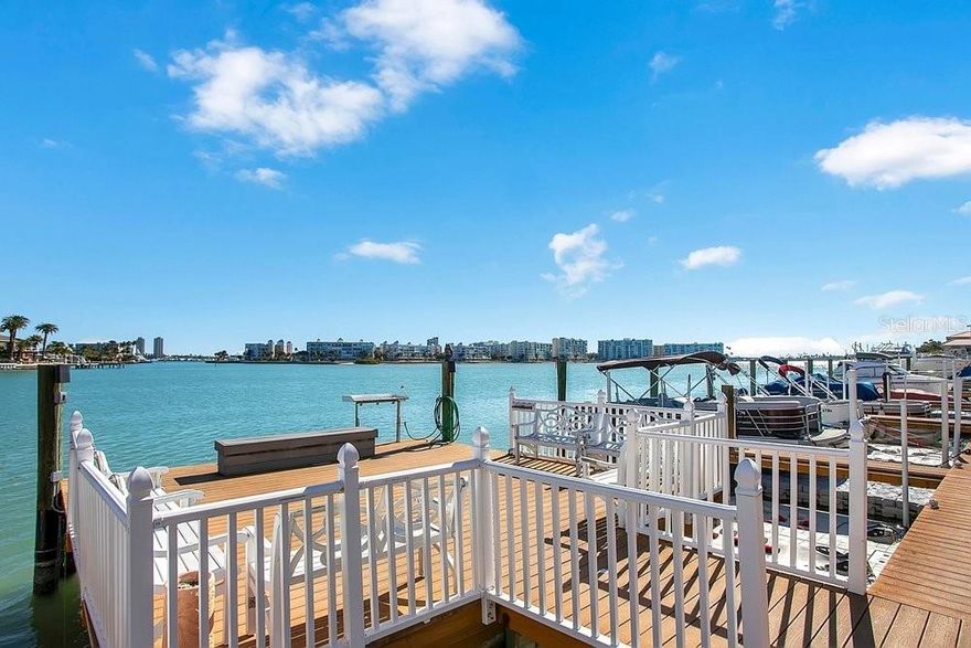 This generously sized coastal home in Boca Shores offers an ideal blend of prime LOCATION and AFFORDABILITY that outdoor enthusiasts will love, featuring two spacious bedrooms and a full bathroom. Recently updated—mainly at the HOA’s expense following Hurricane Helene—the property is equipped with hurricane-resistant impact windows, doors, and sliders. The kitchen showcases modern enhancements including upgraded quartz countertops and stainless steel appliances, alongside a new tankless water heater and updated electric panel and HVAC. The bathroom has been fully remodeled with a walk-in shower, and the entire residence has tile flooring throughout. Positioned on the first floor as a corner unit, it features an oversized, fenced private lanai that will enhance your outdoor enjoyment of Florida living. Situated within a gated community, the monthly HOA fee is $819.21 and covers insurances, building maintenance, cable, internet, water, trash, and sewer services. Residents enjoy access to a heated waterfront pool with views of the Intracoastal Waterway, a community clubhouse equipped with fitness facilities, ample parking, dedicated storage for kayaks and bicycles, and when available, boat slip leases are $91 monthly. The property allows rentals with a minimum lease term of 30 days. Additional on-site amenities include a car wash and vacuum station, laundry facilities, a fishing dock complete with a cleaning station, and the pet policy permits up to two animals, each weighing no more than 35 pounds. This prime location is a paradise for enjoying all things outdoors and especially for beach lovers: just 0.6 miles from the pristine white sands of the Gulf’s Sunset Vista Park, under 1.5 miles from Treasure Island and Upham Beach, 2.5 miles to the popular St. Pete Beach, and 4.5 miles to the historic Pass-A-Grille Beach. Nearby you will find local dining, retail, entertainment options, parks, tennis and pickleball courts, boat ramps, and marinas. Within a 30-minute drive, experience the lively nightlife and diverse culinary scene of downtown St. Petersburg and Gulfport, along with convenient access to St. Pete/Clearwater and Tampa International airports. A milestone inspection has already been completed, making now the perfect time to make your beachfront living dreams a reality and melt away your winter blues!