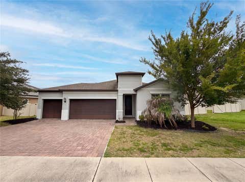 Photo of 528 Bellissimo Place, Howey In The Hills, FL 34737 (MLS # O6414033)