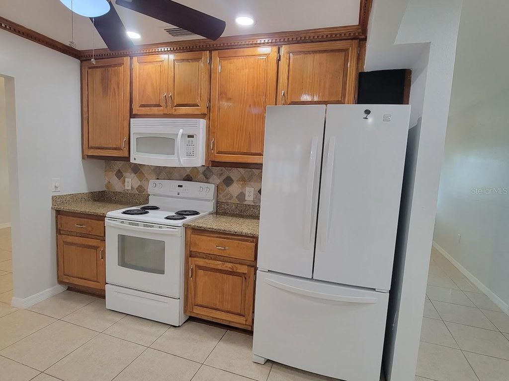 Photo of 1460 Schenley Street, Port Charlotte, FL 33952 (MLS # A4697117)