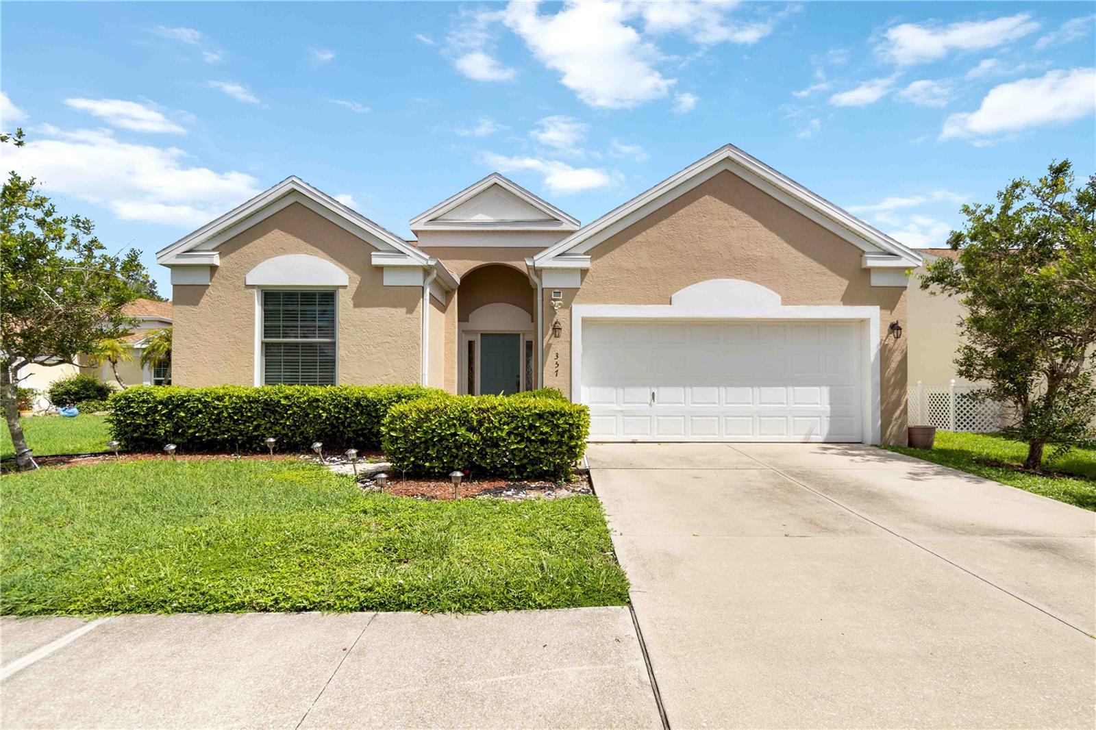 Escape to perfection in Fairway Village! This stunning 3-bedroom, 2-bathroom home is a true gem, meticulously crafted by Pulte. Step into an inviting open floor plan with a brilliant flow of natural light, showcasing a beautifully updated kitchen with quartz countertops, solid wood cabinets and completely updated bathrooms. Elegant ceramic tile and new carpeting throughout. Privacy is paramount with French doors and pocket doors creating a secluded guest wing. Enjoy the tranquil serenity of beautiful lake views from three separate rooms, or relax on the expansive, oversized lanai. Located on a quiet cul-de-sac, this home is an oasis of calm. This property is packed with value, including a 2-car garage, city water and sewer, a sprinkler system, and an oversized homesite. This is more than a home; it’s a lifestyle upgrade. Come see why this property offers the most value for your money!