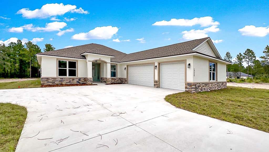 Photo of 12185 SW 98th Street, Dunnellon, FL 34432 (MLS # O6431491)