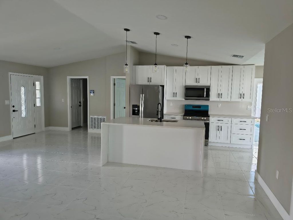 Photo of 1095 Altoona Avenue, Spring Hill, FL 34609 (MLS # TB8434107)