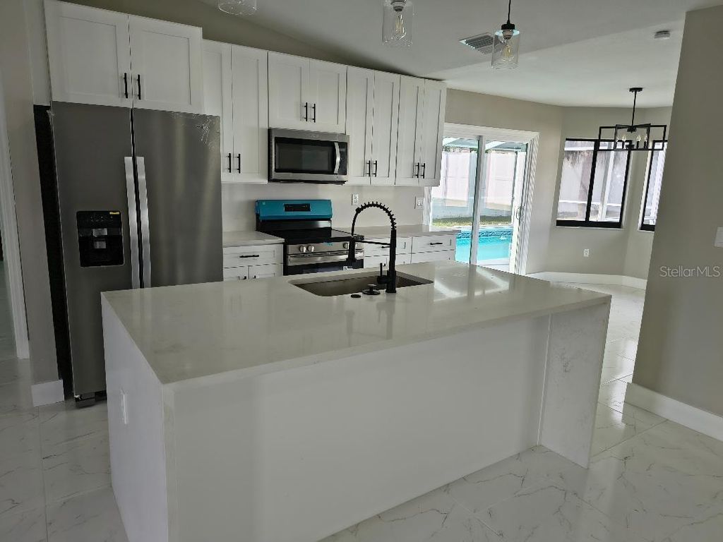 Photo of 1095 Altoona Avenue, Spring Hill, FL 34609 (MLS # TB8434107)