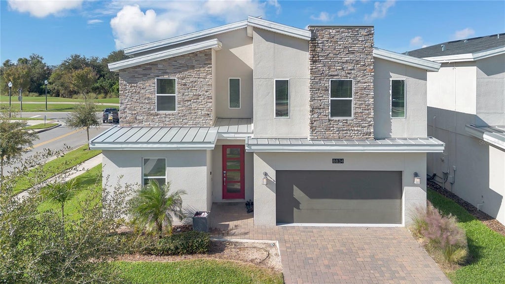 Photo of 8834 Cabot Cliffs Drive, Davenport, FL 33896 (MLS # O6445131)