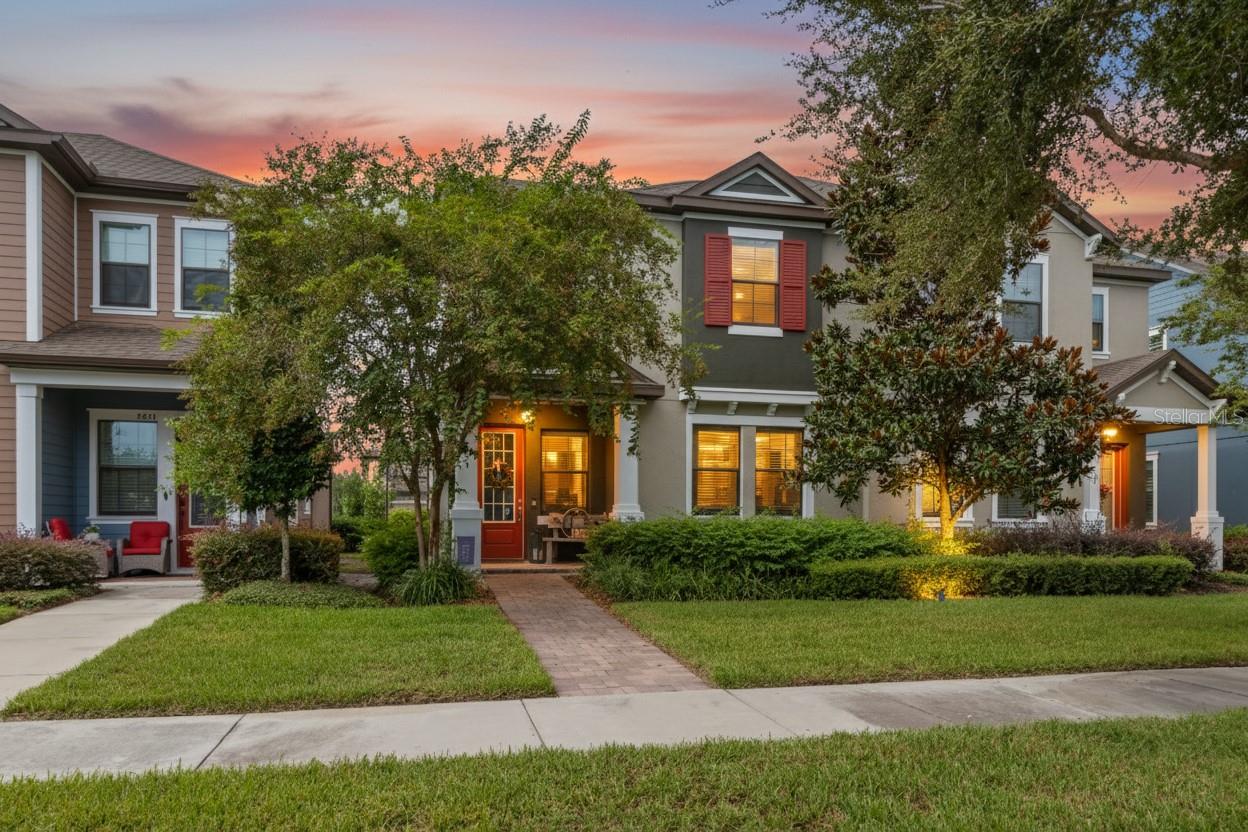 Welcome to this meticulously maintained PAIRED VILLA situated in the highly desirable community of Fishhawk Ranch West that has been lovingly maintained by its original owner. This maintenance-free home features three bedrooms, two and a half baths, and a loft! With the primary bedroom and laundry conveniently located on the first floor, this layout is perfect for multi-generational living and provides a fully functional main level. The walkway and front porch are enhanced with pavers, which is a significant UPGRADE and the front porch offers a delightful space to greet guests. Step inside, and you’ll be amazed! The high ceilings, crown molding, neutral palette, and wood-like tile throughout the entire first floor create a stunning atmosphere. The GREAT ROOM is ideal for daily living and entertaining in this smartly designed floor plan. The kitchen UPGRADES include staggered EXPRESSO cabinetry with crown molding and light rails, GRANITE countertops, and stainless-steel appliances including a GAS range! There is an island which is ideal for food prep and a breakfast bar that has a CUSTOM kickplate that matches the backsplash. The primary bedroom has a CUSTOM feature wall that creates the perfect backdrop for your KING SIZE furniture. The en-suite has dual sinks, GRANITE counters and an UPGRADED shower with glass doors and shampoo niche. There is a convenient half bathroom situated on the first floor, making it perfect for guests. The second floor is accessed on the UPGRADED stairs adorned with laminate flooring, decorative tile risers and wood railings with wrought iron balusters. The loft provides a variety of options, such as a TV room, play area, or office space. The secondary bedrooms feature carpeting, generous storage, and easy access to the second full bathroom, which boasts GRANITE counters and UPGRADED shower tiles in the tub/shower combination. There is a side porch that has UPGRADED pavers between the home and the entrance into the TWO car garage. Parking is no concern with the extended driveway and additional guest parking in the front of the home! Fishhawk Ranch West Residents will have access to RESORT-STYLE amenities include a lap pool, splash pad, clubhouse, playground, dog park, walking/biking trails, and the LAKEHOUSE where there is a gathering room, kitchen, billiards, ping pong and a fire pit that overlooks the lake. The schools are TOP RATED and include Barrington Middle School, Newsome High School and Stowers Elementary that is within walking distance of this MAINTENANCE FREE home where your fees cover the roof, exterior paint (last completed 2024), and lawn care!