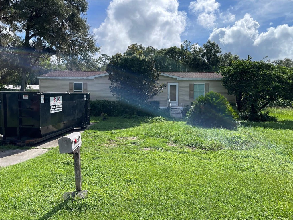 Photo of 3561 NE 59th Terrace, Silver Springs, FL 34488 (MLS # OM732021)