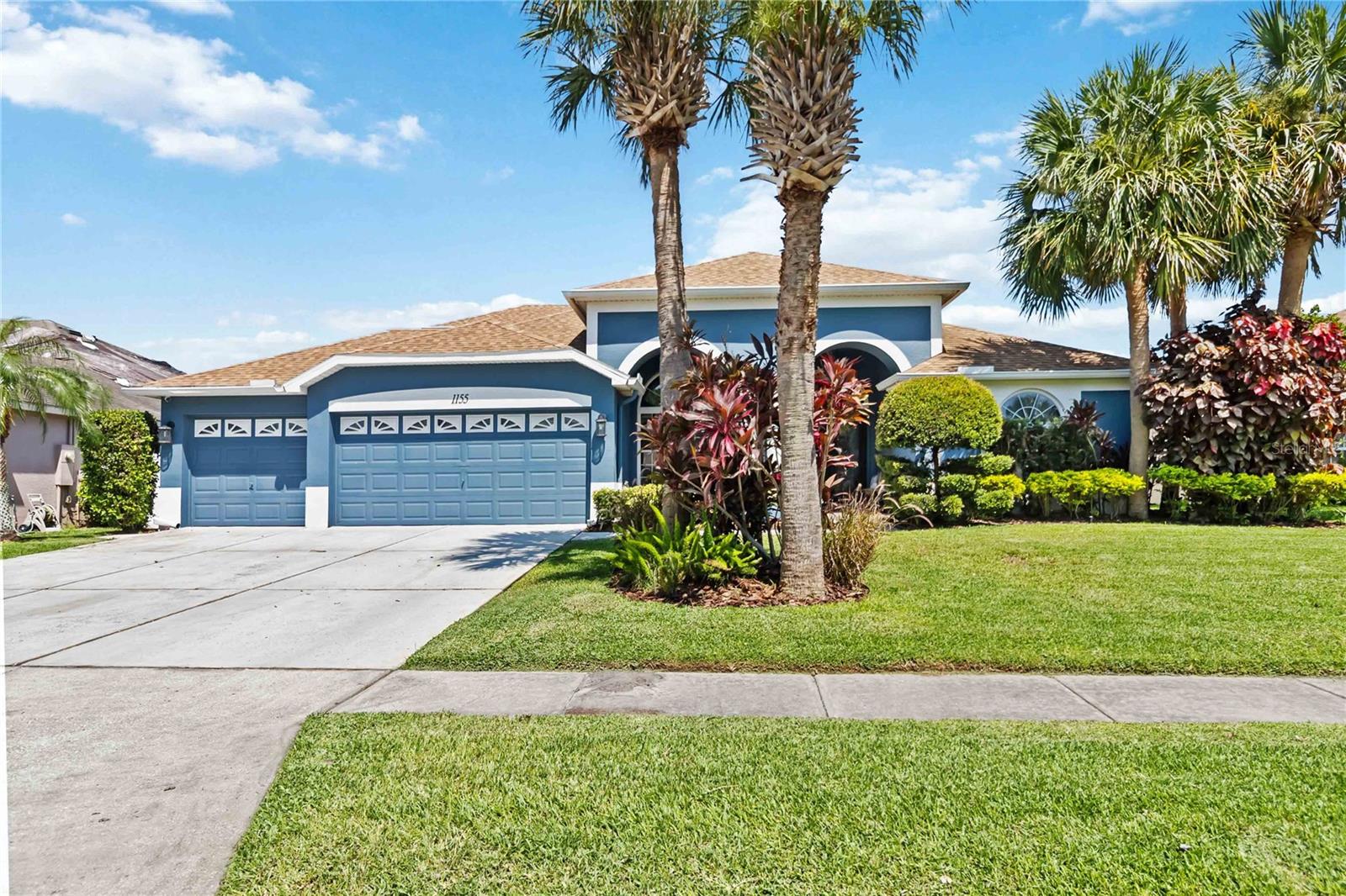 Step into timeless comfort and thoughtful design with this stunning 5-bedroom, 4 full bath home, complete with a 3-car garage and your very own saltwater pool—all nestled within a beautifully landscaped yard that feels like a private retreat.
From the moment you arrive, this home welcomes you with mature trees, charming curb appeal, and a stately, grounded presence. Inside, you're greeted by elegant tile flooring that runs through the main living spaces and into the primary suite—a durable, beautiful foundation for everyday living.
At the heart of the home, the kitchen combines warmth and function with updated cabinetry, stylish hardware, modern countertops, and a ceiling-mounted pot rack that adds a collected, curated feel. Stainless steel appliances are included, so it’s ready for everything from quiet breakfasts to big family dinners.
Design-forward touches include updated lighting throughout, custom tilework on the stairs, and artful wall treatments that add personality and texture. The bathrooms and cabinetry have all been refreshed to reflect a calm, cohesive interior style.
Upstairs, you’ll find a generous loft, a full bath, and a spacious guest suite, offering flexible space for guests, hobbies, or growing families.
Outside, the backyard is truly a destination. With mature landscaping, fruit trees, an herb garden, and a covered lanai, it feels like a getaway—ideal for slow mornings or lively weekend gatherings. The saltwater pool is surrounded by lush greenery and peace, and the entire yard is fully fenced for privacy.
This home has been thoughtfully updated throughout. The roof and solar panels for the pool were replaced in 2022, and a high-efficiency variable-speed pool pump was installed to keep everything running smoothly. A whole-house water softener was recently added, and the exterior was freshly painted in 2023. Even the garage is climate-controlled, thanks to a new split AC unit, making it a comfortable and versatile space year-round.
As one of the largest floor plans in the neighborhood, this home offers space to grow, gather, and create lasting memories. Come experience it in person—you'll feel right at home the moment you walk through the door.