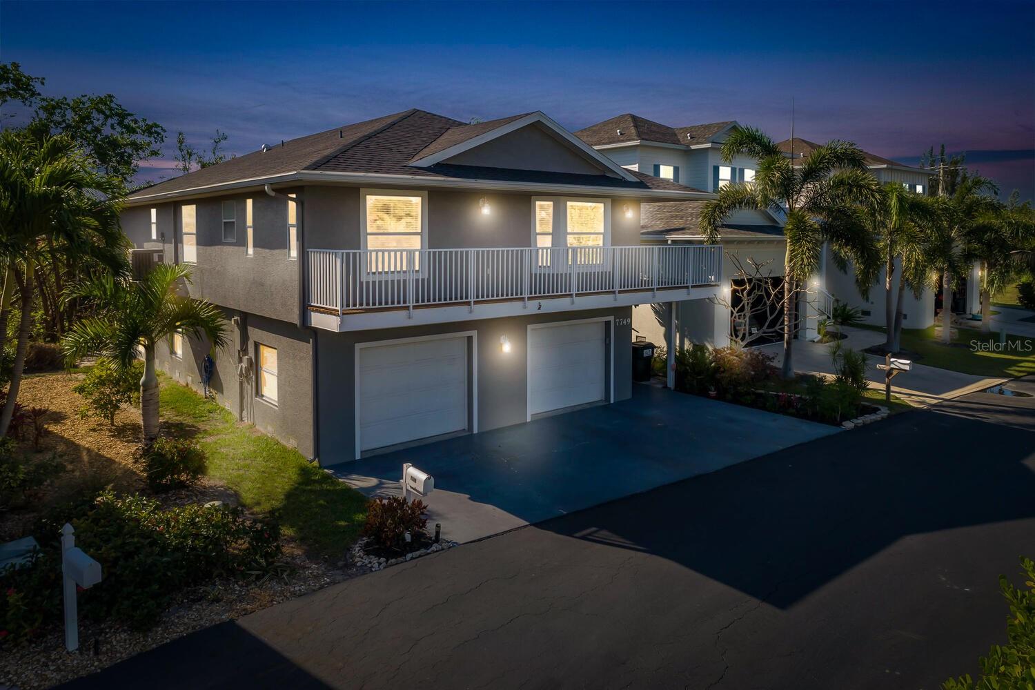 Discover your dream coastal getaway in the bustling heart of Fort Myers, FL! This captivating single-family home offers Direct Gulf Access, making it ideal for those who love the water. With 3 bedrooms, 3 full bathrooms, and a versatile mother-in-law suite complete with its own living area and kitchenette, this home provides space and flexibility for all your needs. As you walk through the door, you'll be greeted by an open kitchen designed to impress, featuring premium granite countertops, an expansive island, and top-of-the-line stainless steel appliances. The spacious living areas boast high ceilings, recessed lighting, and a blend of elegant hardwood and tile flooring. The primary ensuite promises relaxation with its separate shower, double sinks, and a generous walk-in closet. Bask in the beauty of sunrise and sunset views from your private wrap-around balcony, or host memorable gatherings on the screened-in porch and/or deck, perfect for outdoor dining and barbecues. Additional highlights includes a new roof in 2022, a home gym, and an oversized 2-car attached garage. Location is surrounded by shopping and dining and just 20 minutes from the Gulf! his home combines convenience with a serene escape. Plus, this community allows for weekly rentals, it's also a fantastic investment opportunity. This is a one of a kind property, seize the chance to own this exciting haven in a prime location!