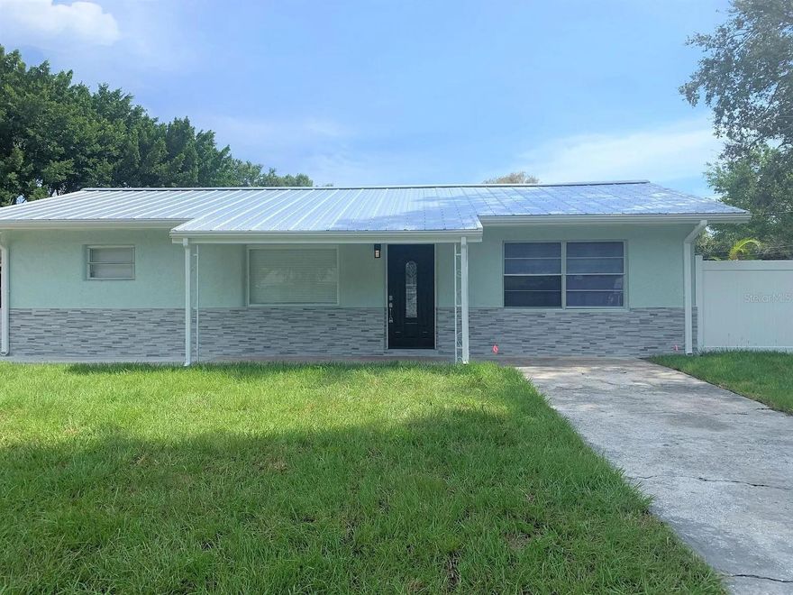 Move In Ready!!Remodeled & updated 3 bedroom, 2 bathroom home in a great central location on a quiet cul de sac street. laminate floor throughout whole house. New kitchen cabinets, granite countertops, refrigerator, dishwasher. New Bathroom Vanity, Split floor plan. The BONUS room can be used as a TV room, game room, home office. Freshly Painted Interior and exterior. Large Fenced Yard with new sod . NO HOA ,Boat Parking allowed. Great location centrally located close to Trader Joe's, groceries, restaurants, and downtown Shopping / Dinning, Siesta Key and Sarasota Memorial Hospital. On a quiet tree lined street makes you feel far removed from the hustle and bustle. The perfect place to call home. Don't miss the opportunity to make this home your piece of paradise for your HOLIDAY in 2025!!