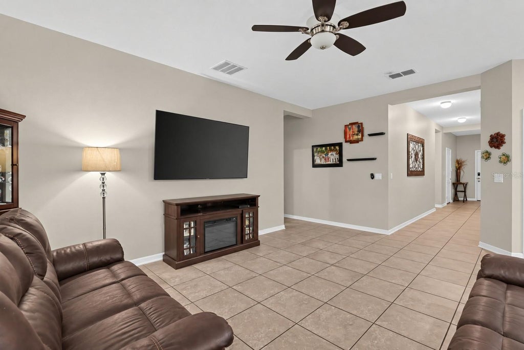 Photo of 225 Lakeshore Drive, Davenport, FL 33837 (MLS # TB8552067)