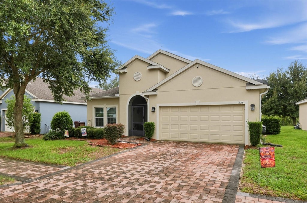 Photo of 225 Lakeshore Drive, Davenport, FL 33837 (MLS # TB8552067)