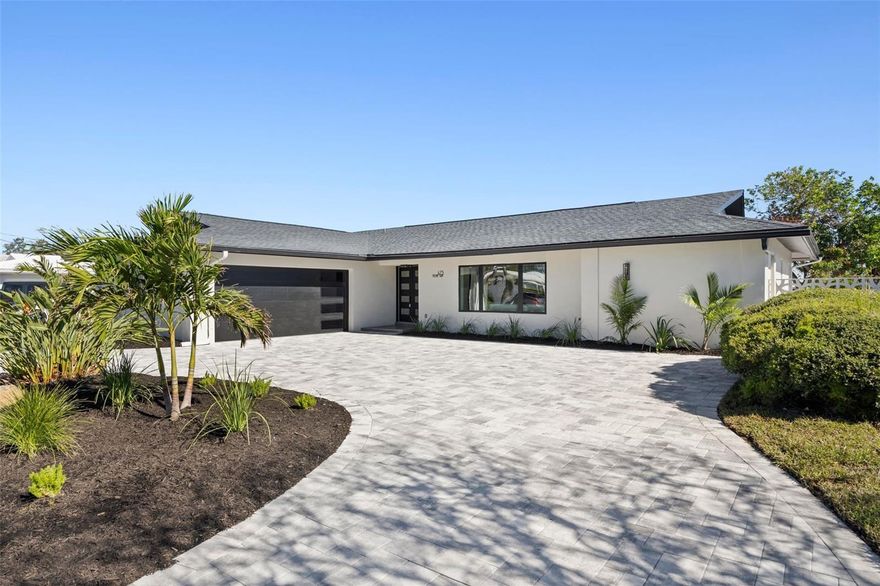 Waterfront Luxury Without Compromise in a home that was never flooded by the Hurricanes. 
Positioned on deep water in the heart of Island Estates, this fully reimagined 4-bedroom, 3 full , 2 half-bathroom residence delivers the kind of waterfront life most people only dream about and it does it without a single item left on your to-do list.
Set on sailboat water with direct, bridge-free access to the open Gulf, larger vessels dock with ease at the private 30x6 ft dock, and open water is minutes away. This is not a boating community nod, this is a true boater's address.
Inside, a top-to-bottom Scandinavian-inspired renovation creates a home that feels as calm and intentional as its setting. Wide plank engineered hardwood floors anchor the open concept layout, where every room flows with purpose. The chef's kitchen features a large island, quartz countertops, a walk-in pantry, and a dedicated breakfast counter that makes the kitchen feel like a destination of its own. Two primary suites  each with private en-suite baths and walk-in closets offer flexibility for multi-generational living, frequent guests, or simply having your own world within the home.
Step outside and the pool, deck, and canal align in one uninterrupted sightline. The outdoor half bath keeps the entertaining seamless, and the west-facing exposure means evenings here are something special.
Every major system has been replaced:

New roof
New HVAC and ductwork
Hurricane impact windows and doors throughout
New bathrooms and water heater
Paver driveway

Per the seller, this home has remained high and dry through every recent storm — a rare and meaningful distinction at this price point.
A quick golf cart ride puts you at Publix, local restaurants, and everyday conveniences, with Clearwater Beach just minutes beyond. Island Estates is one of the most sought-after waterfront communities on Florida's Gulf Coast, and this address sits right at the center of it.
Move-in ready. Zero deferred maintenance. Nothing left to do but live here.
Schedule your private showing today.