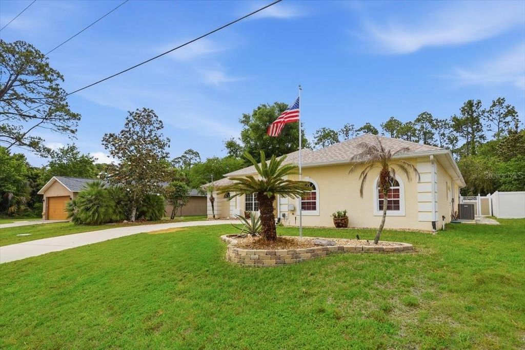 Photo of 26 Porcupine Drive, Palm Coast, FL 32164 (MLS # FC318217)