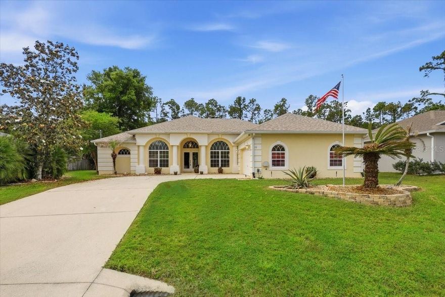 Step into comfort and style in this beautifully designed 2006-built home with a new roof and new AC system. This beautiful home offers 4 spacious bedrooms and 2 full bathrooms, thoughtfully crafted for both everyday living and entertaining.

From the moment you arrive, you’ll notice the elegant double front doors, manicured landscaping with decorative stone beds, accent rocks, and a charming island with a flagpole.  

The open floor plan seamlessly connects the main living areas. A stunning living room creating a bright and upscale atmosphere throughout features a lighted coffered ceiling and overlooks the screened lanai and sparkling gunite pool—perfect for relaxing or hosting guests. The dining room is conveniently located off the kitchen and offers views of both the living room and the front of the home, enhancing the flow of space and light.

The kitchen is a standout with 42" maple cabinets topped with crown molding, stainless steel appliances, a large pantry, and a beautiful butted window that frames serene views of the pool and lanai area.

Retreat to the oversized master suite, complete with its own lighted coffered ceiling. The luxurious master bath includes a walk-in closet, double sinks, a soaking tub, a large separate shower, and an additional linen closet for extra storage.

Three additional bedrooms are generously sized, each featuring ceiling fans and ample closet space. Throughout the home, you'll find a blend of ceramic tile flooring in the main areas and freshly cleaned carpeting in the bedrooms.

Additional highlights include a side-entry oversized 2-car garage with plumbing already in place for a potential third bathroom, offering flexibility for future expansion.

This home truly combines elegance, functionality, and comfort—inside and out. Schedule your showing today and experience it for yourself!  Information is deemed reliable but not guaranteed and is subject to errors, omissions, prior sale, change or withdrawal without notice. Buyers should independently verify all information.