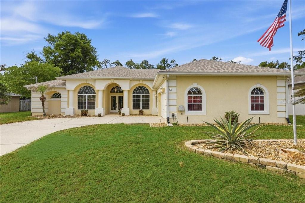 Photo of 26 Porcupine Drive, Palm Coast, FL 32164 (MLS # FC318217)