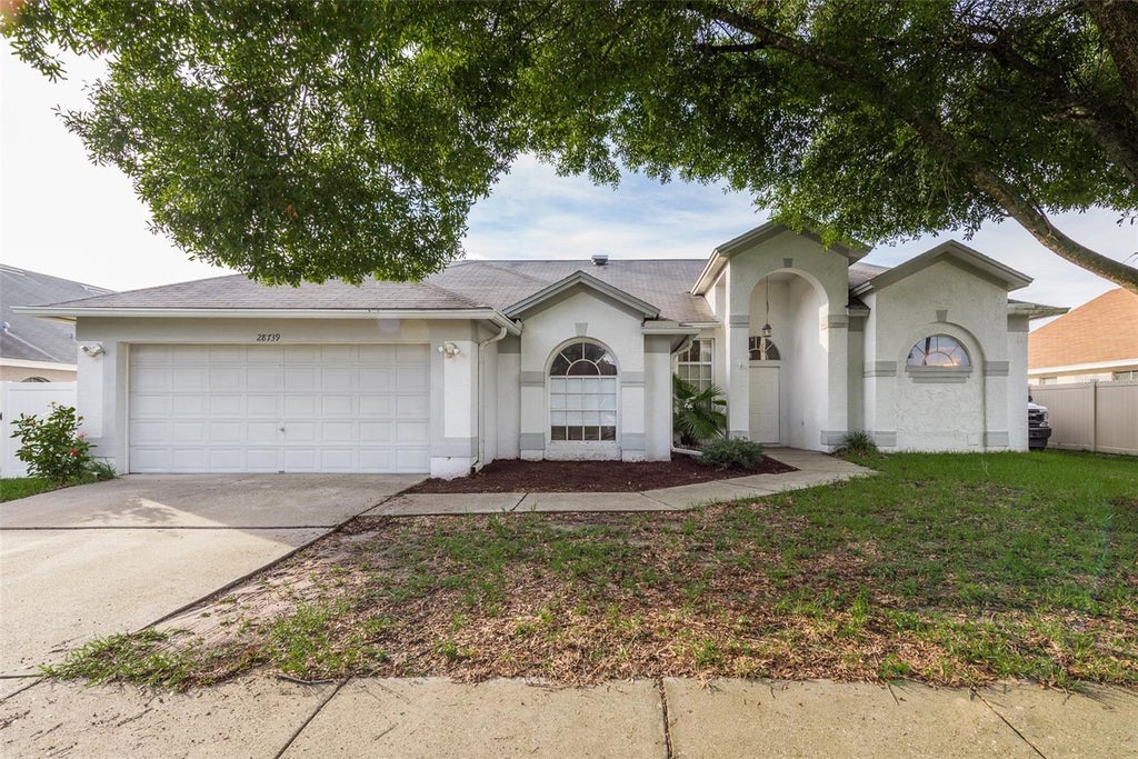 Photo of 28739 Cottagewood Drive, Wesley Chapel, FL 33545 (MLS # TB8526547)