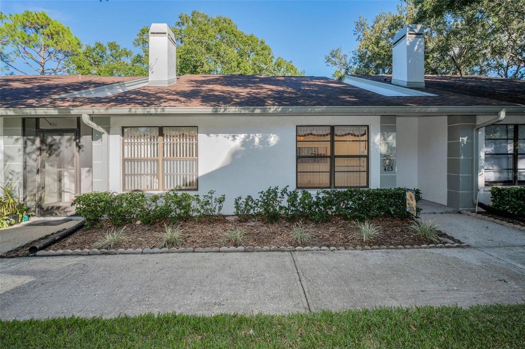 Photo of 3500 Magnolia Ridge Circle #405, Palm Harbor, FL 34684 (MLS # TB8524729)